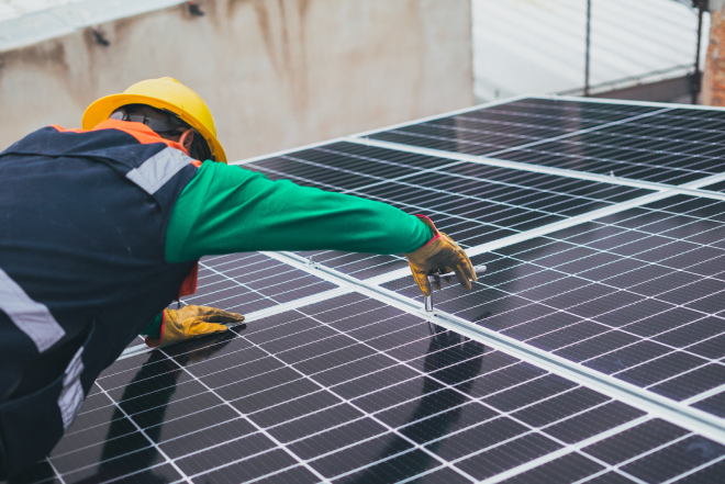 Why Solar? Solar Engineer installing solar panel in Colorado Springs